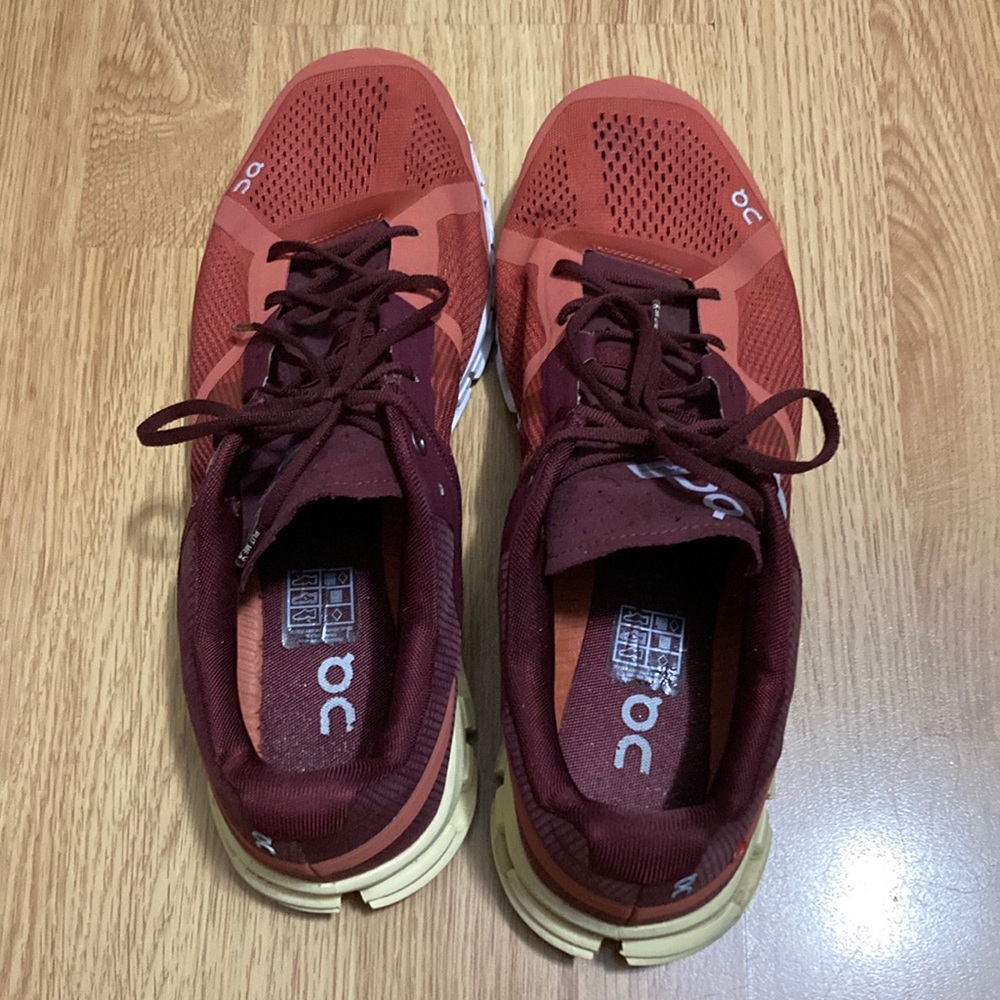 On Running Burgundy and Orange Athletic Shoes